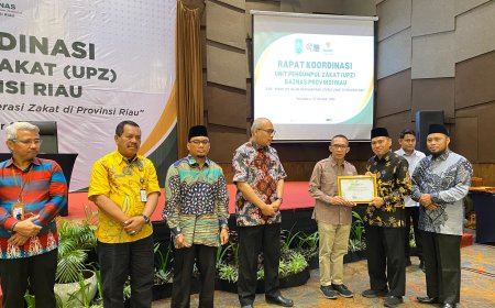 Mitra Pendukung Payroll System, BRK Syariah Terima Penghargaan dari Baznas Riau