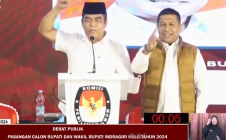 Tampil Paling Santun, Raja Haryono-Elda Suhanura Menjadi Sorotan di Debat Publik KPU Inhu