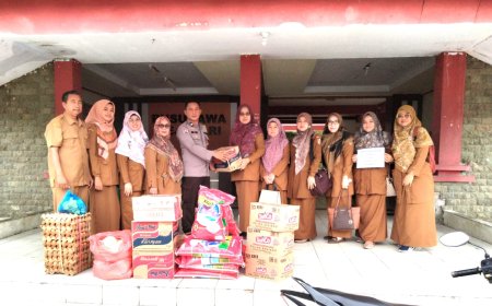 SMP Negeri 9 Pekanbaru Bantu Korban Banjir di Tenayan Raya