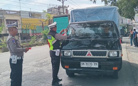 Sambut HUT RI ke-80, Polsek Kualuh Hulu Gelar Aksi Nasionalisme di Jalinsum Aek Kanopan