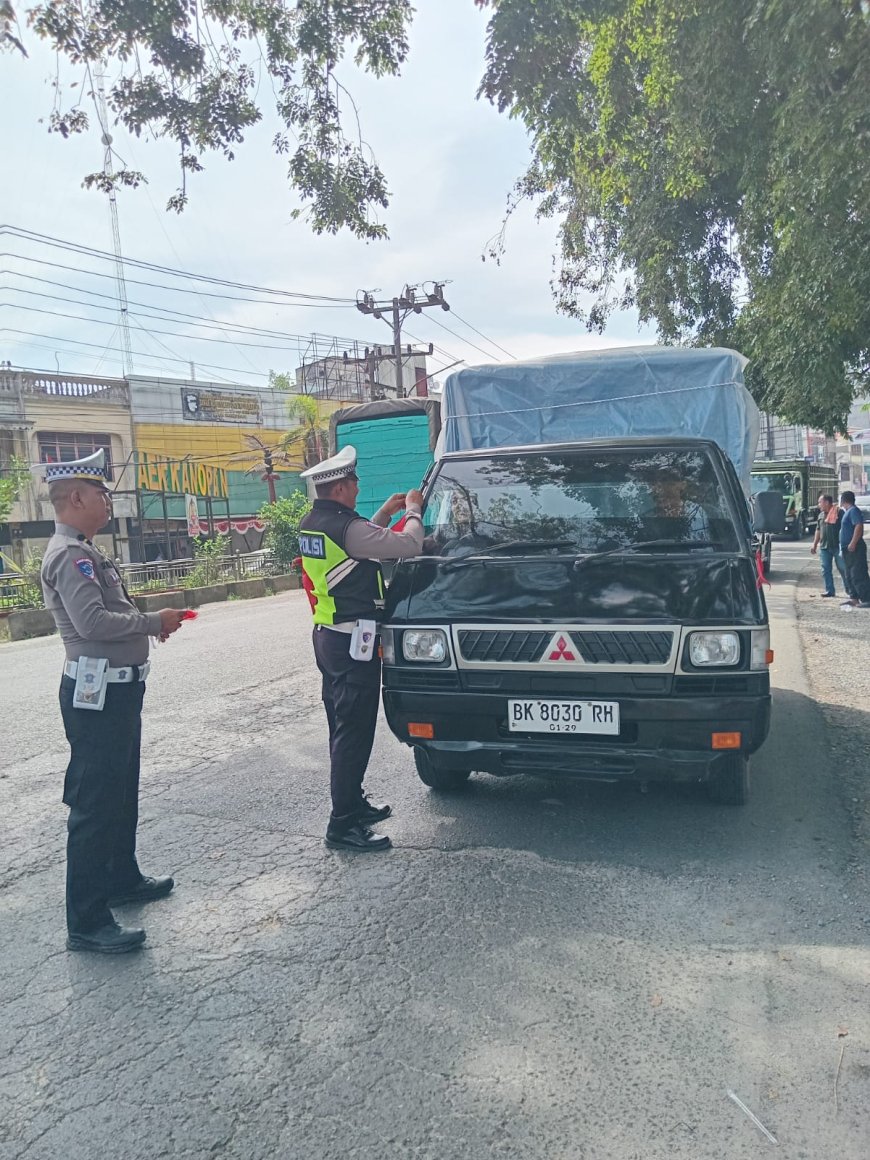 Sambut HUT RI ke-80, Polsek Kualuh Hulu Gelar Aksi Nasionalisme di Jalinsum Aek Kanopan